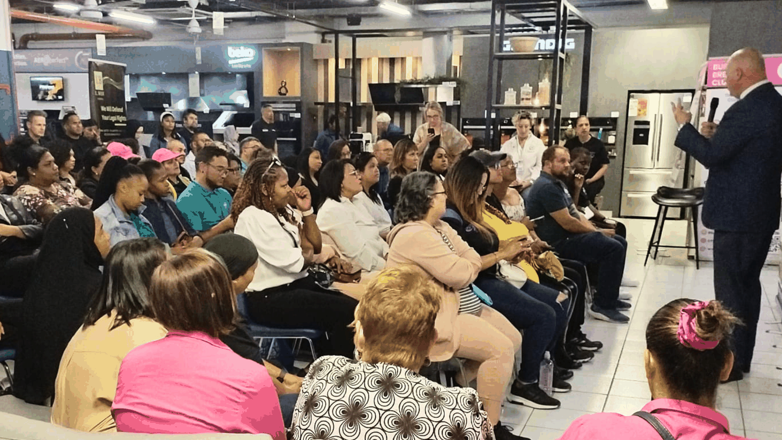 Small business owners attending a community business event in Cape Town